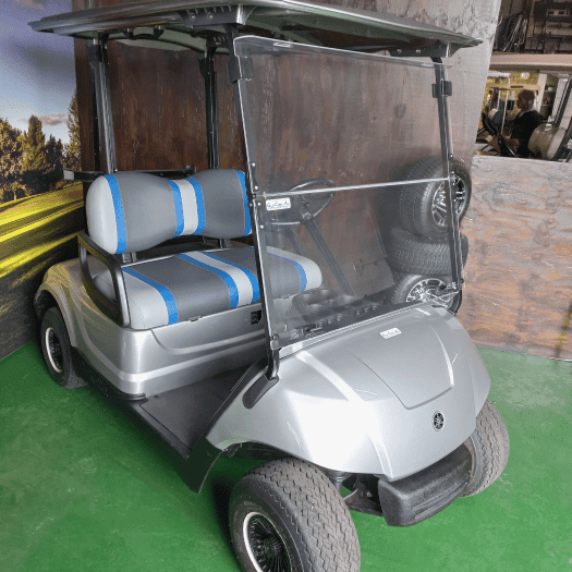 A fully refurbished golf cart on display ready to be sold